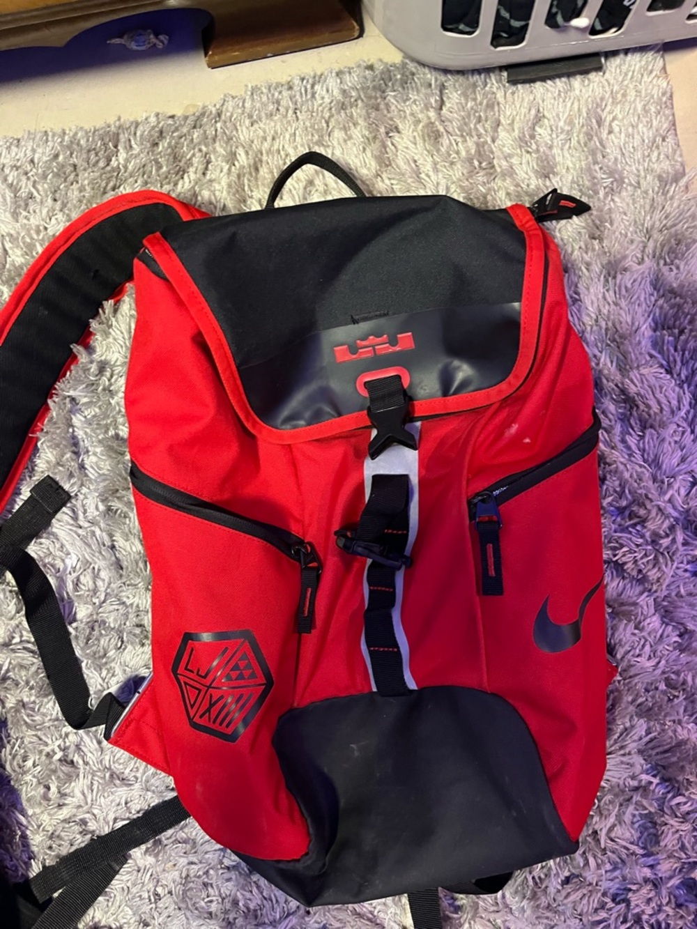 Nike Red and Black Sports Backpack with Swoosh Detail